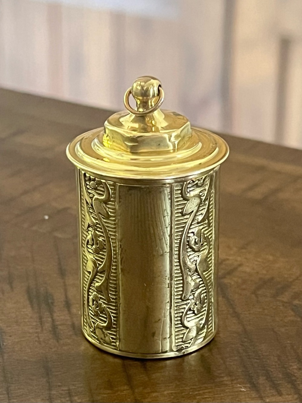 Antique Victorian era embossed brass thimble case pendant 2.25” floral scroll
